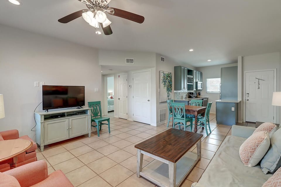 Relax in your bright, open-concept space where turquoise accents and coastal charm create the perfect home base for your getaway.