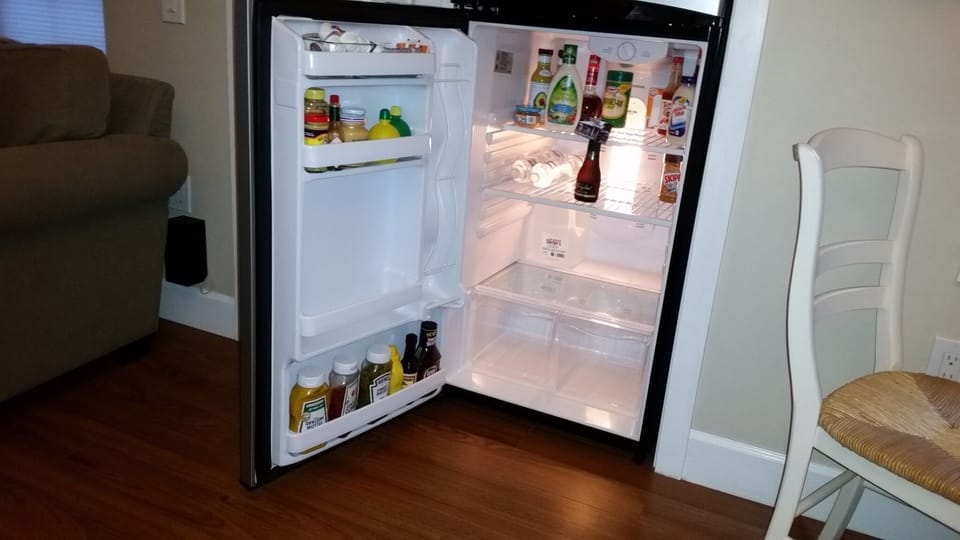 The refrigerator has an Ice Maker. and many condiments.