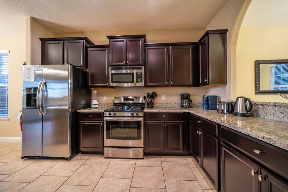 Fully equipped kitchen with stainless steel appliances