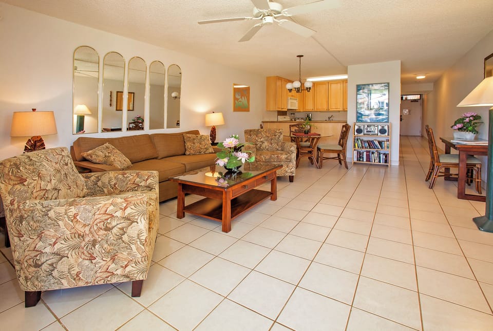 Step into your home away from home, where a bright, open layout welcomes you with inviting living spaces, a fully equipped kitchen, and tropical-inspired décor that sets the perfect tone for relaxation.