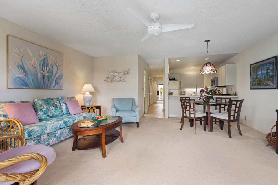 Relax in your inviting open-concept space, where tropical-themed décor, comfortable seating, and a fully equipped kitchen create the perfect island retreat for your stay.