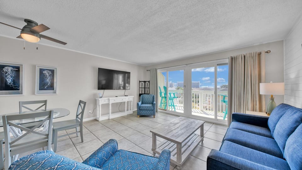 Located on the second floor of the popular and family-friendly, beachside community of Sandpiper Cove, it features a private deck with an expansive view of the lush, green golf course and sparkling, seasonally heated pool.