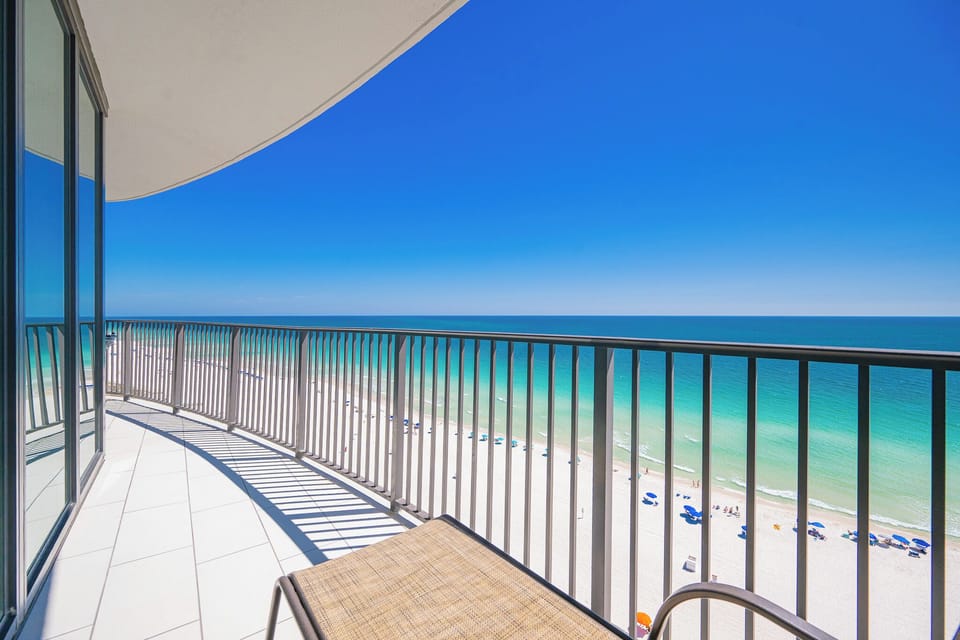 Feel the warmth of the gulf breeze as you relax on your balcony watching waves roll onto the shore below