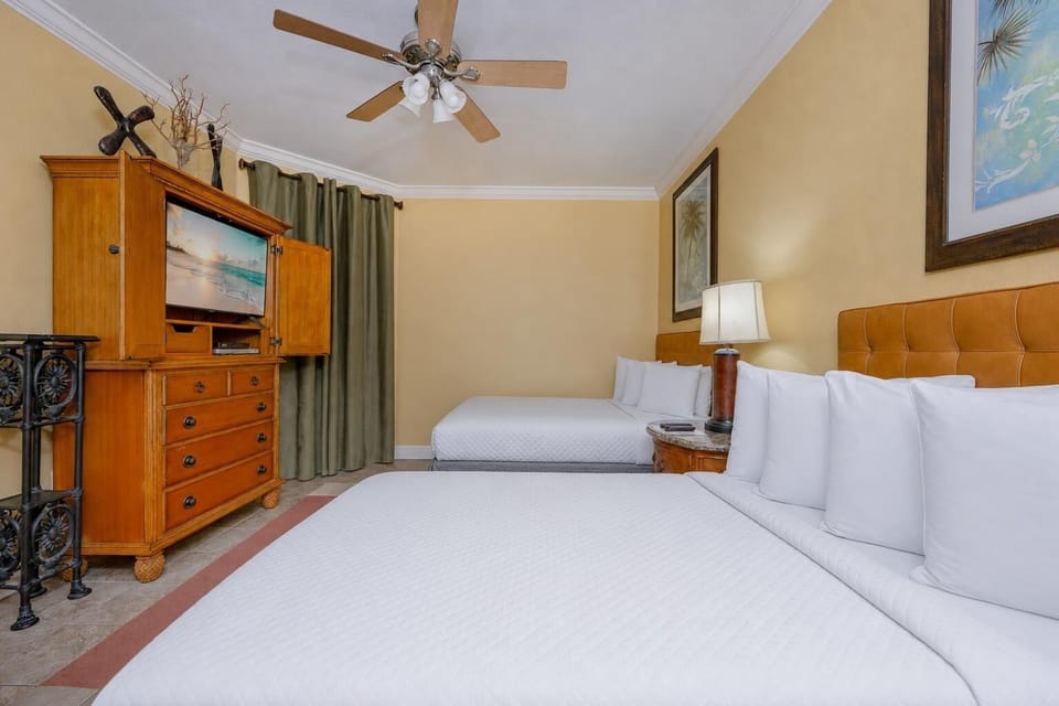 Unwind in the guest suite with two double beds after a day on the water