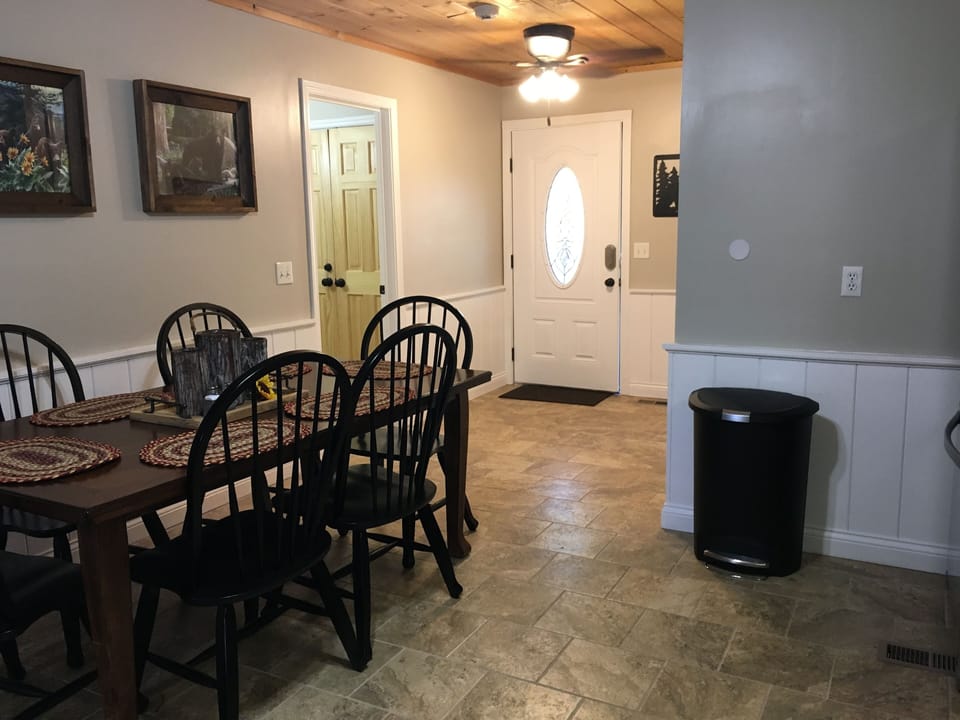 Staircase leading down to basement.  To the left are the queen bunk beds 