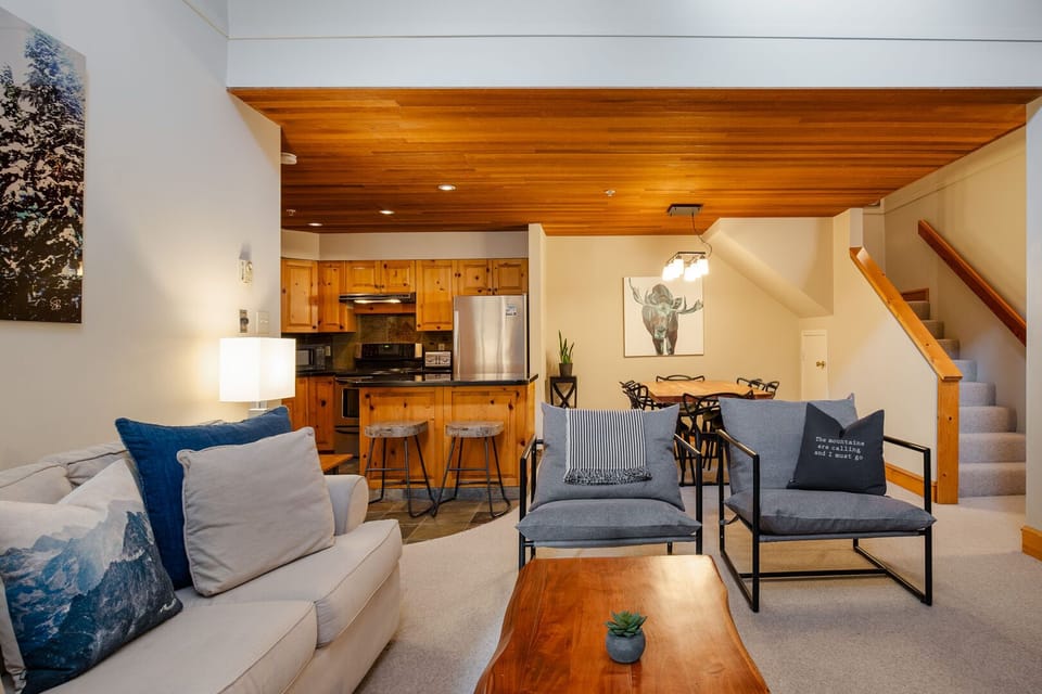 Bright, stylish, and open concept living area with modern tech and charm.