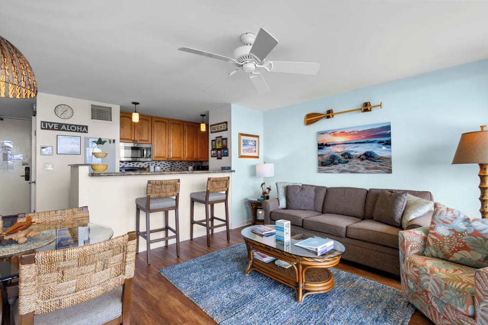Step into your island-inspired retreat with soothing coastal colors and comfortable seating—perfect for unwinding after beach adventures or gathering with loved ones over tropical cocktails.