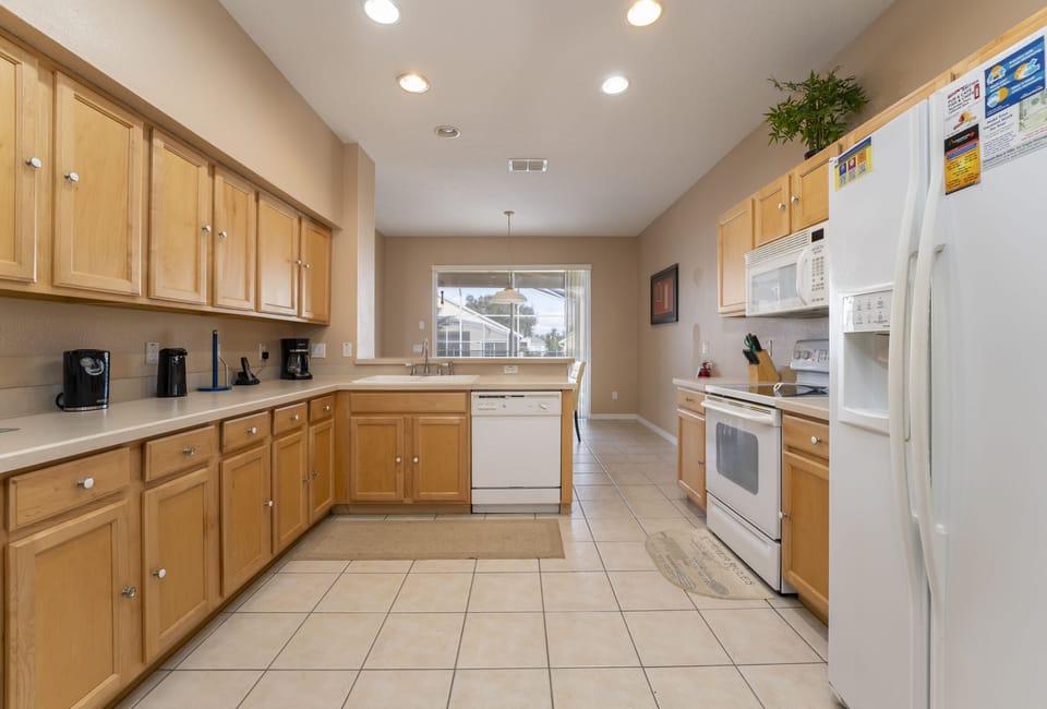 Fully equipped kitchen with modern appliances in a Central Florida vacation rental.