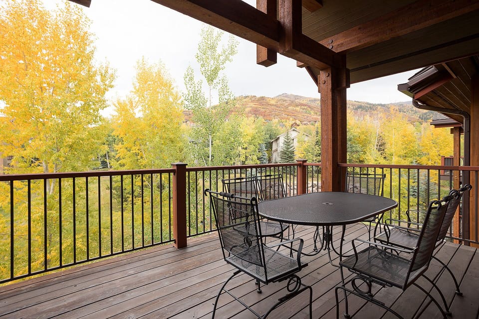 Sip your morning coffee while soaking in stunning autumn mountain views from your private covered deck.