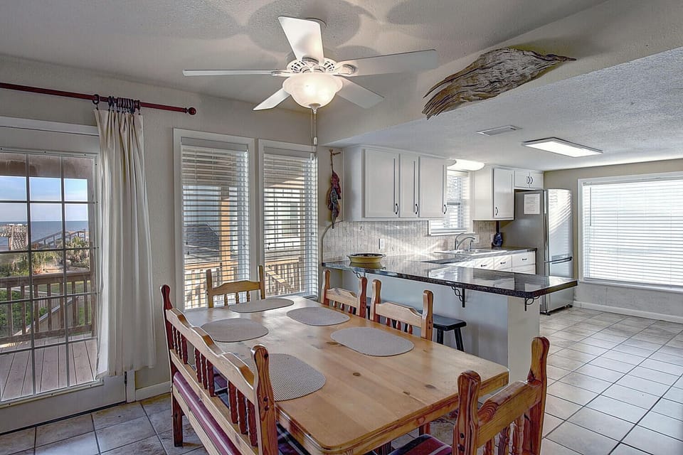 Your bright, open kitchen and dining space features modern appliances and a welcoming dining table where you can enjoy meals together.