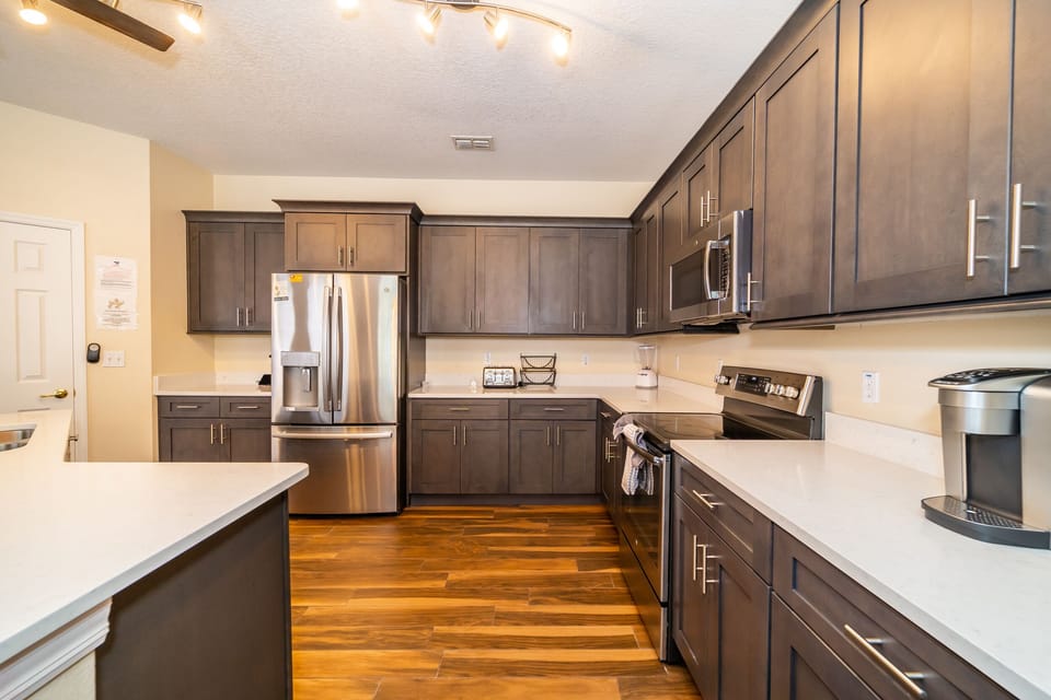 Fully equipped kitchen with stainless steel appliances