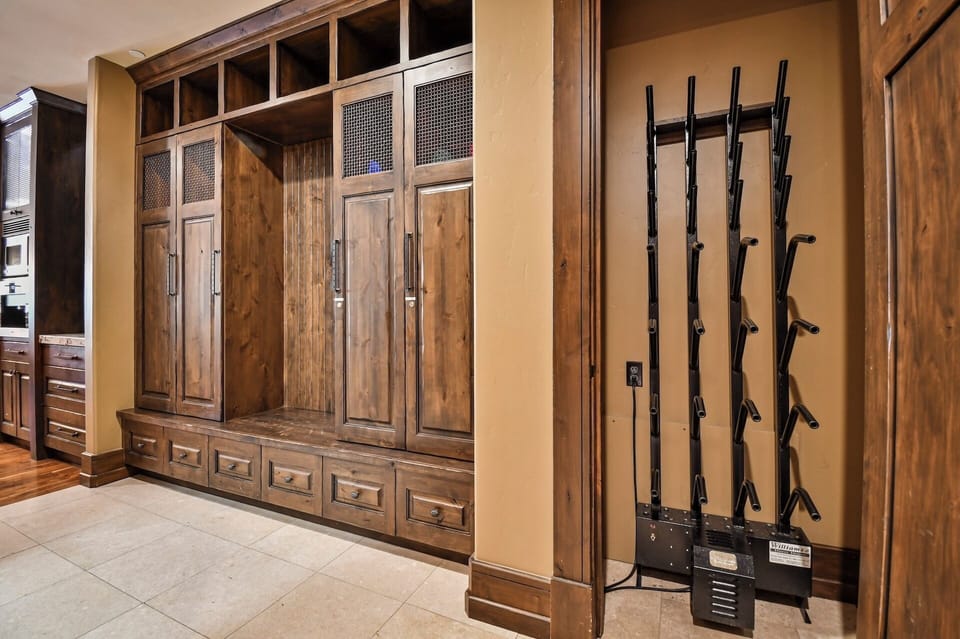 Store all your gear in custom-built wooden lockers and organize your equipment with dedicated storage racks, keeping everything tidy and ready for adventure.