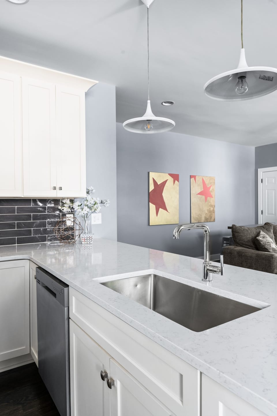 Kitchen is stocked with dishwasher detergent, dish soap & trash bags.