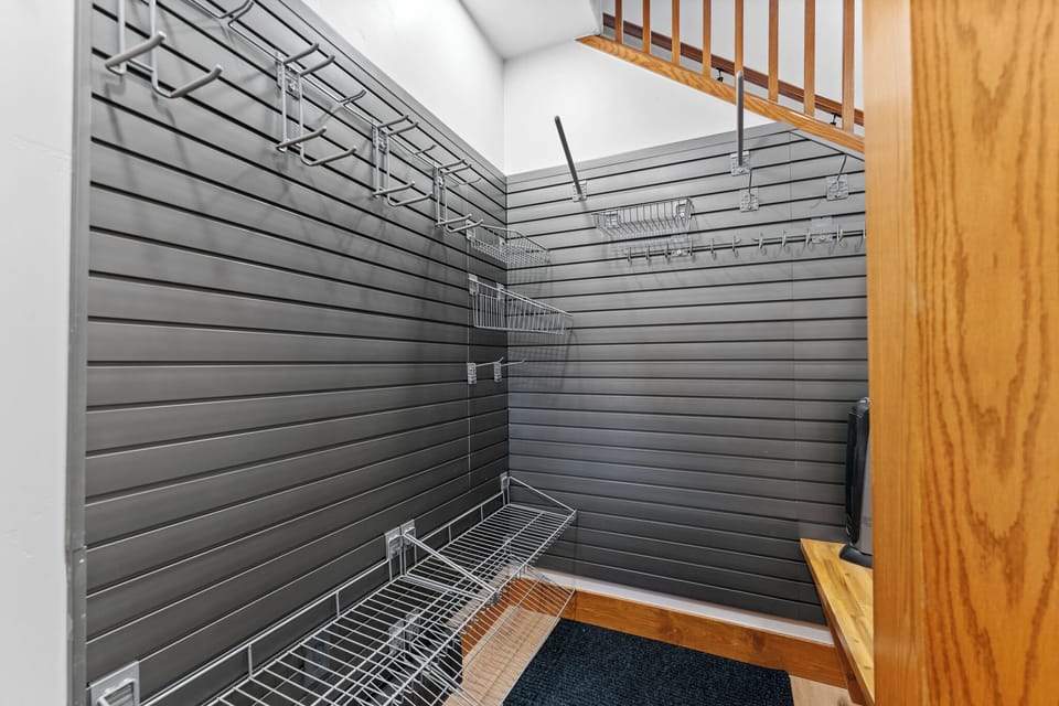 Your walk-in closet features smart organization systems with pull-out baskets and hanging space to keep your belongings perfectly arranged during your stay.
