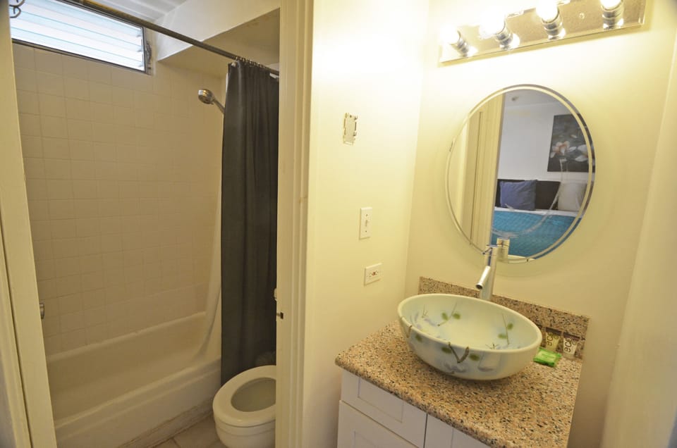 Bathroom with tub/shower.