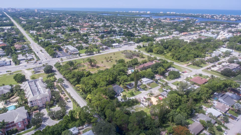 Ariel view of community and Bonita Beach drive down to Bay and beach