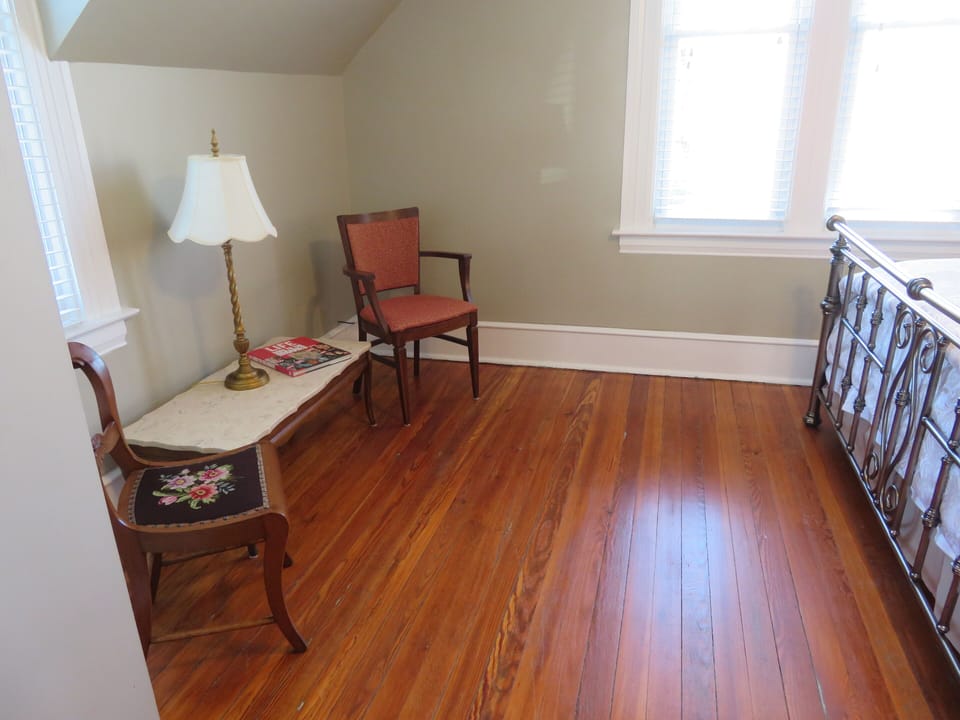 Seating area can be easily converted and set up with a twin bed upon request.