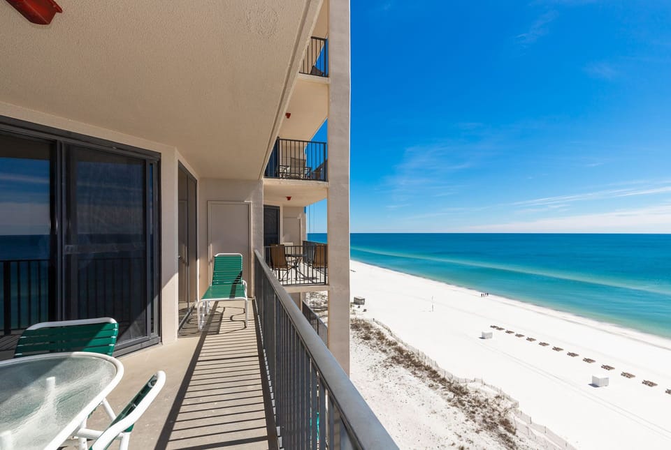 Enjoy a sunrise view from your balcony while relaxing with the tranquil waters and inviting shoreline