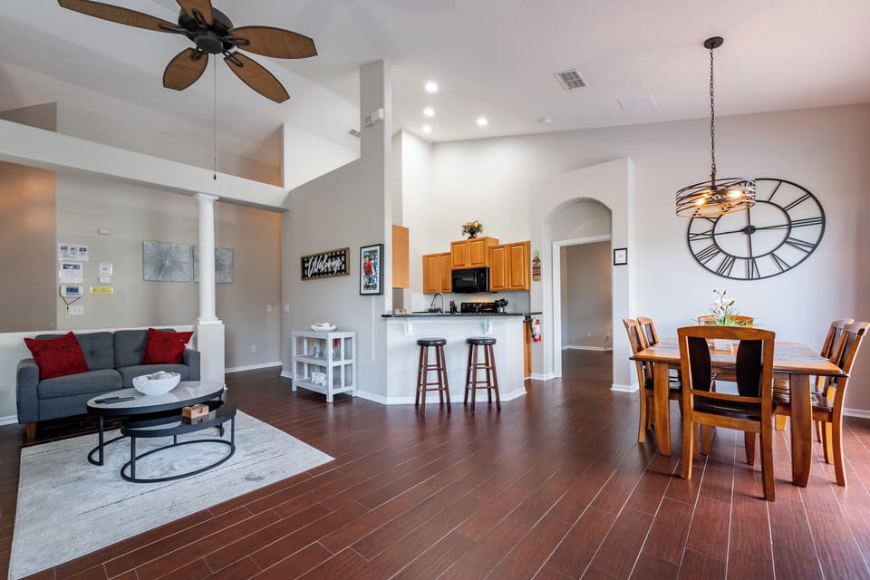 Open floor plan showing living room, kitchen, and dining room