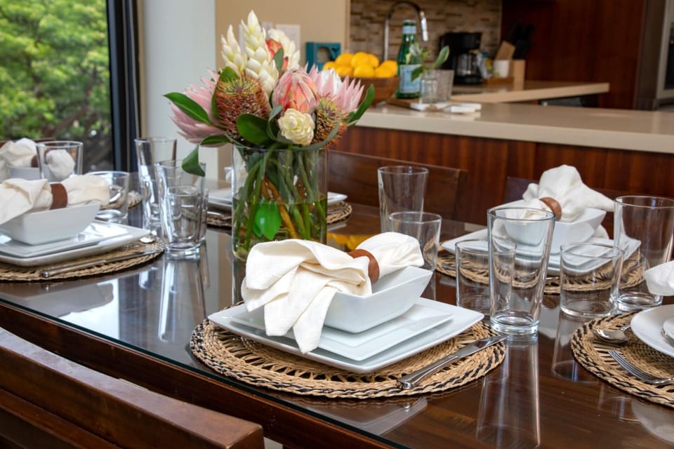 A curated stillness lingers where culinary rituals become sacred, framed by verdant vistas and soft-spoken design poetry   