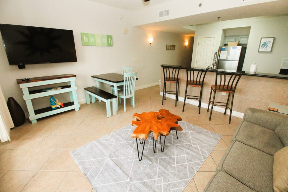 Spacious living room with new 55 inch smart TV
