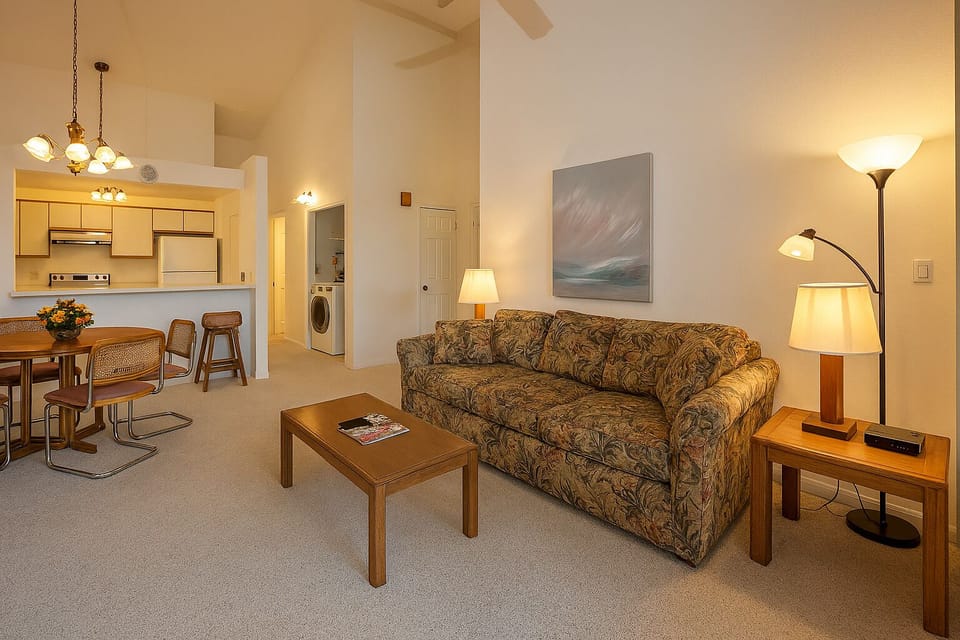 Open-concept living with a cozy sofa, dining area, and kitchen just steps away. Your home-away-from-home includes everything for comfortable relaxation and convenience.