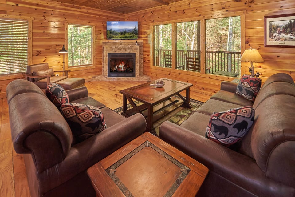 Gas fireplace in great room with open plan
