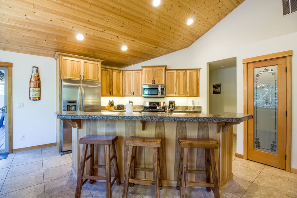 Kitchen w/ Bar and Seating for 3 more