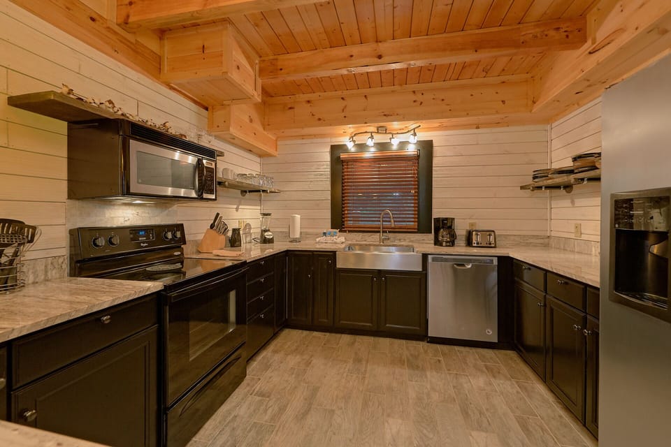 Full Kitchen with loads of storage space, blender, toaster, coff