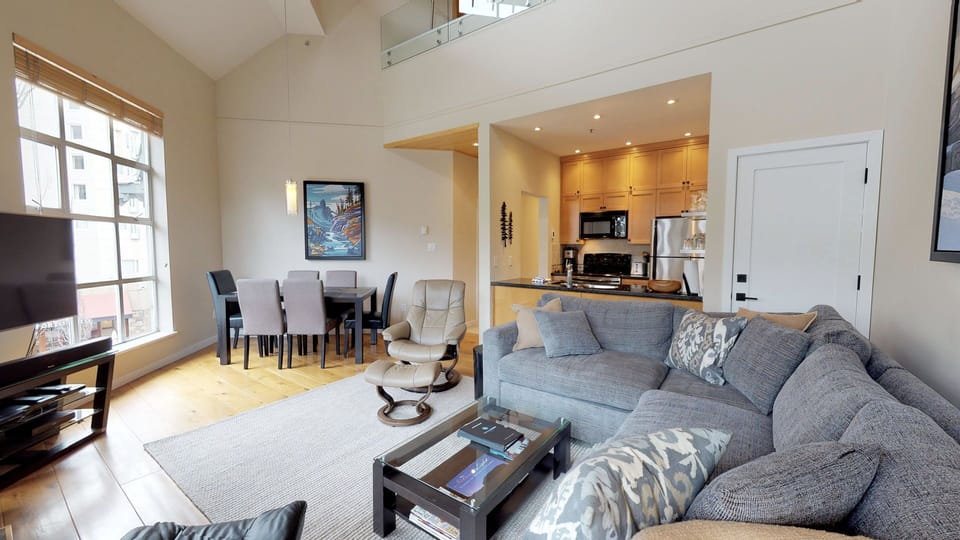 The sofa converts into a bed, accommodating extra guests with ease.