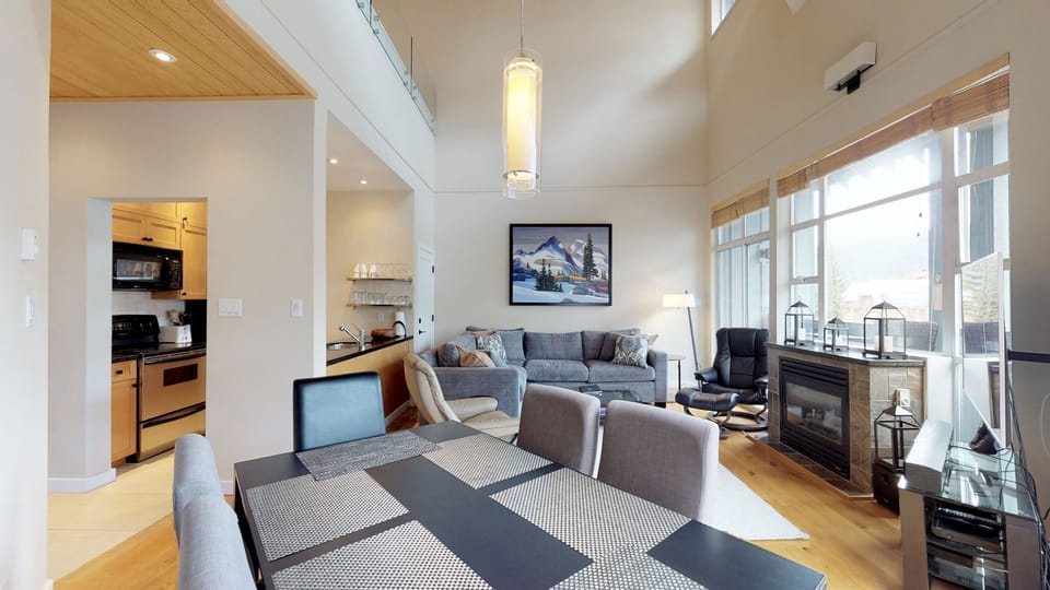 The dining area is integrated into the open-plan layout for easy mealtime gatherings.