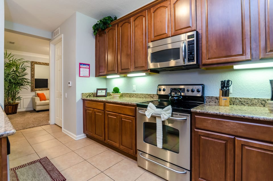 The Kitchen-– a haven where you can prepare your favorite meals or simply brew a comforting cup of coffee or tea. Embrace the joy of cooking and the comforts of home in every dish and sip.