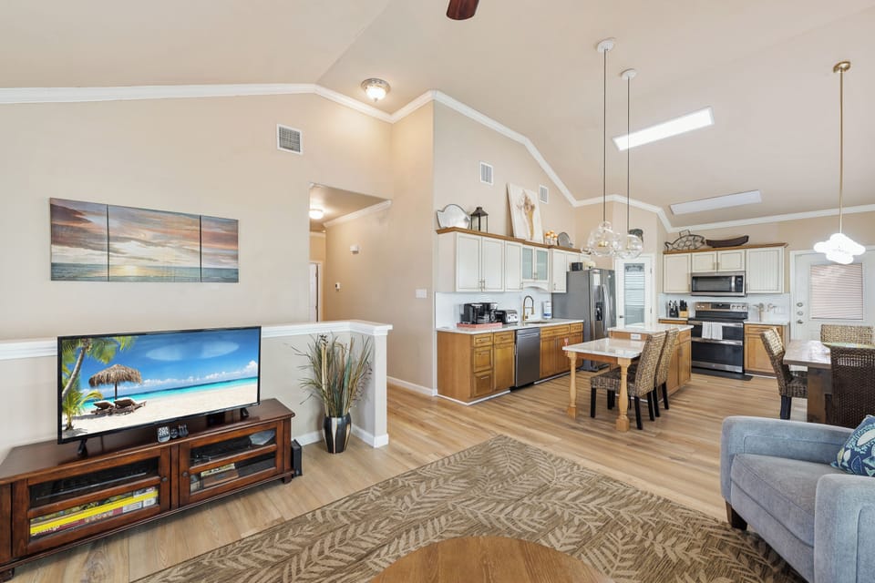 Enjoy seamless open-concept living where the comfortable lounge, dining area, and fully equipped kitchen create the perfect space to connect.