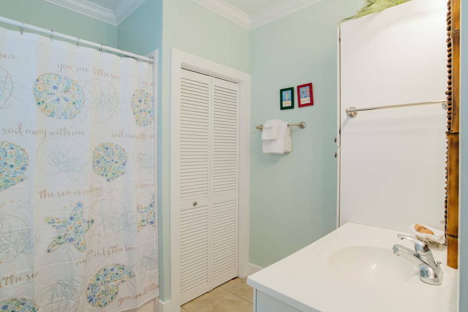 14 Purple Parrot Resort One Bedroom Condo 18cd by Perdido Key Resort Management Bathroom