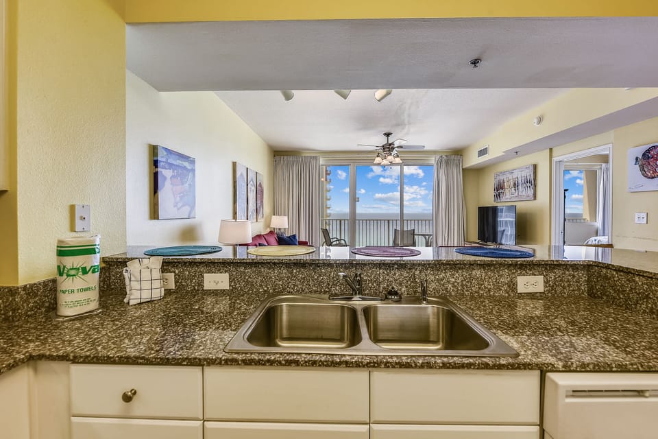 Fully Stocked Kitchen overlooking Living Room