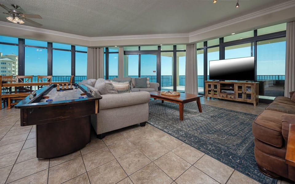 Experience cozy evenings in the living room, playing games, streaming favorites, and enjoying stunning views