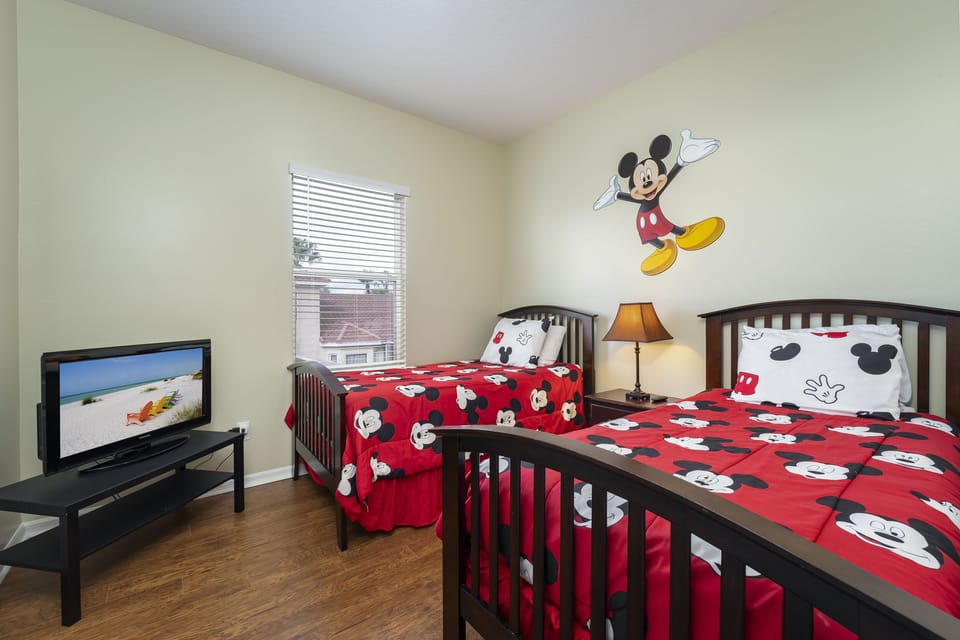 Bedroom 4 Upstairs showing  2 twin beds and TV