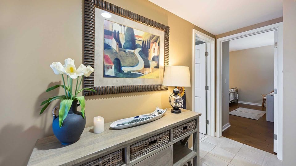Entry to Jack & Jill Bathroom and 2 Double Guest Romm