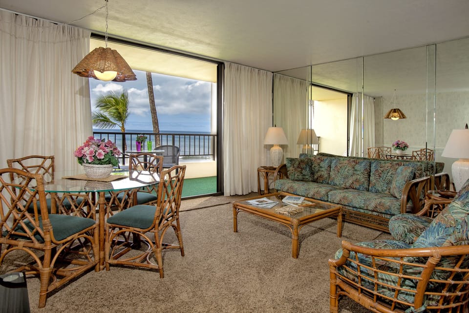Relax in your bright, tropical-inspired living space with island-style furnishings and a private balcony overlooking the ocean—your perfect retreat after exploring.