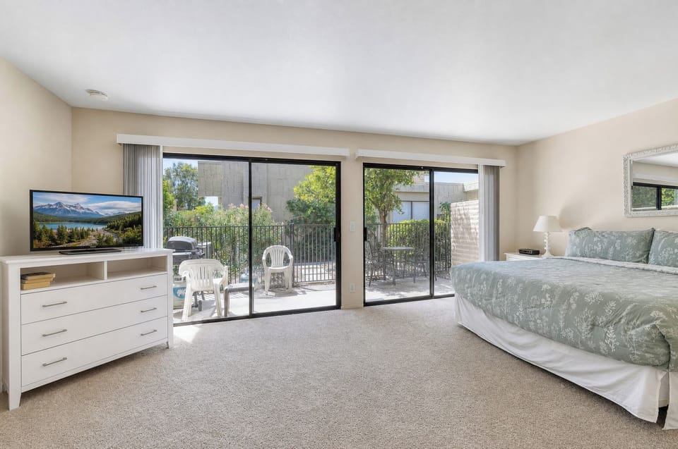 Step into your spacious bedroom where natural light fills the room and sliding glass doors open to your own private balcony—perfect for morning coffee or unwinding under the stars.