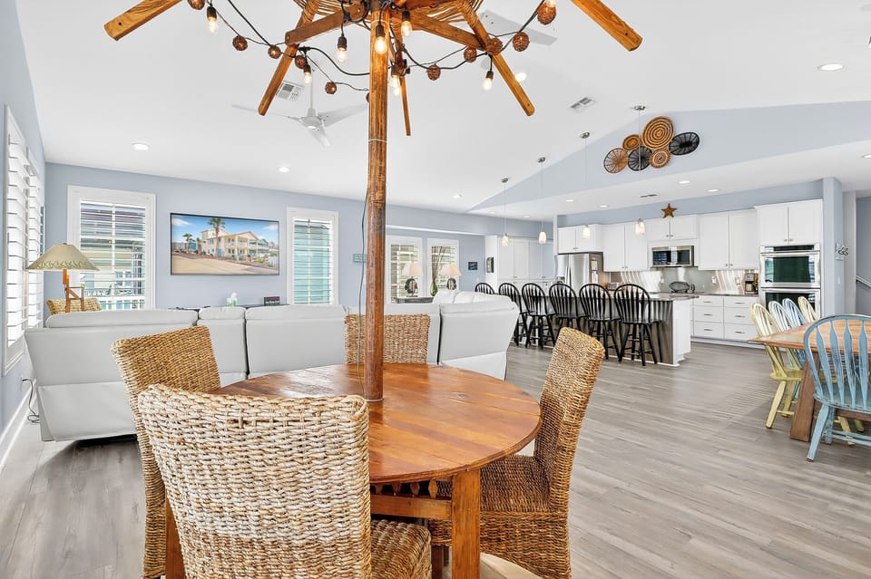 Your open-concept living space flows beautifully from cozy dining to spacious kitchen, perfect for gathering with loved ones.