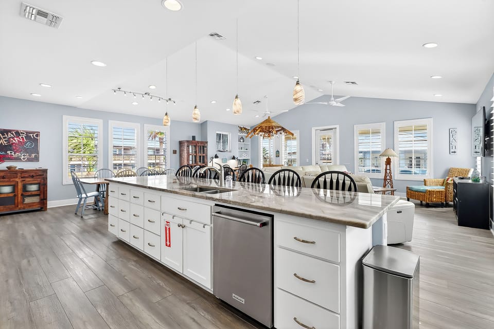Gather around this spacious kitchen island where you'll create memories over shared meals and morning coffee.