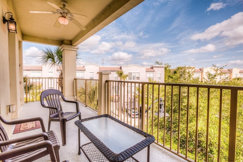Balcony:  This scenic private retreat offers a tranquil setting for relaxation, inviting you to unwind and soak in the surroundings. With cozy outdoor seating, it's the perfect spot to bask in the fresh air and embrace moments of serenity.