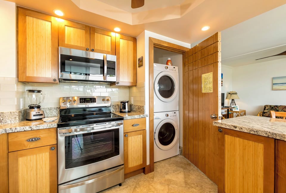 This well-equipped kitchen has everything you need for comfortable stays, including a full-size stove, microwave, and convenient in-unit washer and dryer for easy laundry access.