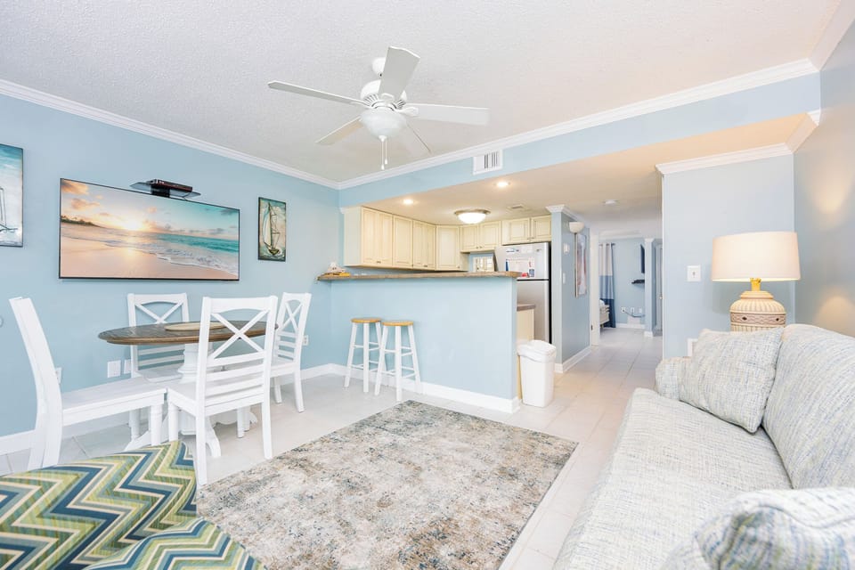 Relax in this inviting space, where you can enjoy your favorite shows while surrounded by beach-inspired decor