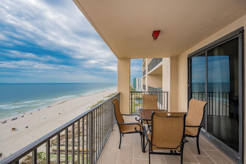 Savor meals at the outdoor table while enjoying the expansive views of the shoreline and tranquil waters