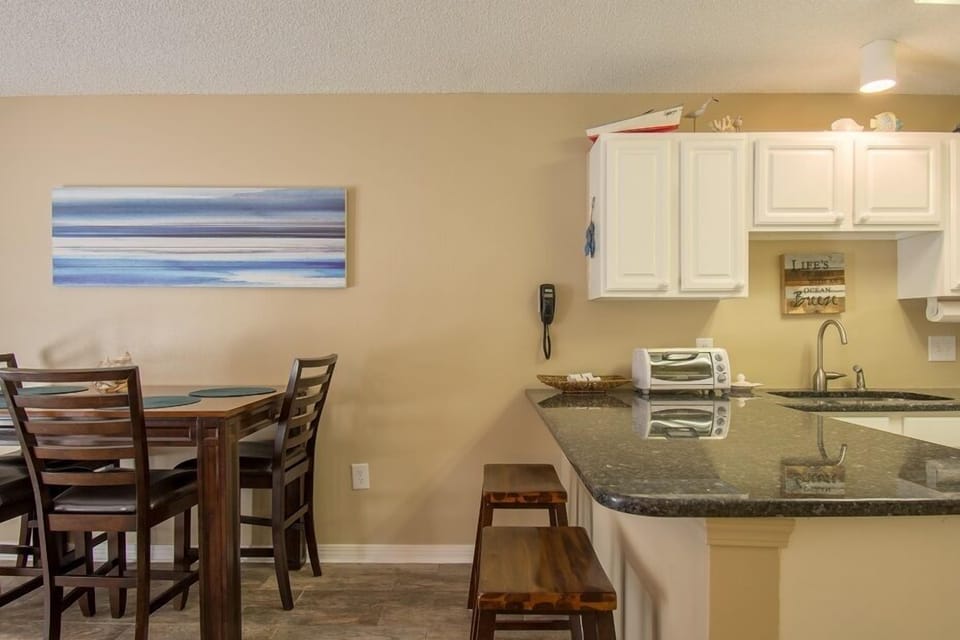 19 Grand Caribbean West 116 Dining Area and Kitchen