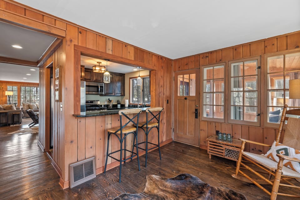 Kitchen & dining area connected by a convenient passthrough bar.
