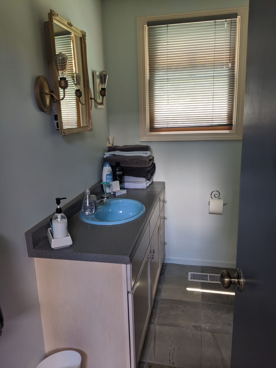 Main floor has full bath with tub. Paper goods, towels and toiletries provided.