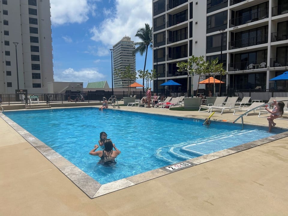 Heated Pool with lots of Lounge chairs to relax and enjoy your Vacation.
